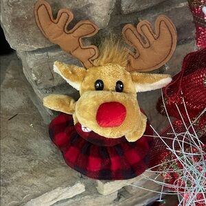 Christmas reindeer w/ red and black plaid dress.